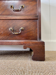 A Petite English Mahogany Bachelors Chest of Drawers Dresser with Brushing Slide  c1800