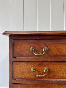 A Petite English Mahogany Bachelors Chest of Drawers Dresser with Brushing Slide  c1800