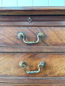 A Petite English Mahogany Bachelors Chest of Drawers Dresser with Brushing Slide  c1800