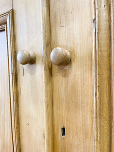 A Charming English 19th Century Pine Cupboard with Wooden Knobs