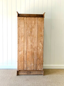 A Handsome English 19th Pine Cupboard with Dark Wooden Knobs