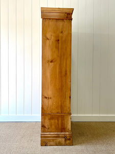 A Handsome English 19th Pine Cupboard with Dark Wooden Knobs