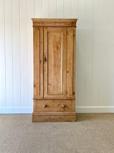 A Handsome English 19th Pine Cupboard with Dark Wooden Knobs