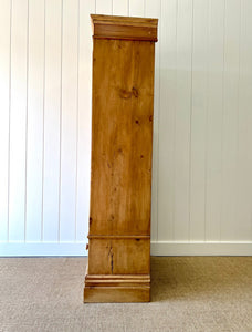 A Handsome English 19th Pine Cupboard with Dark Wooden Knobs