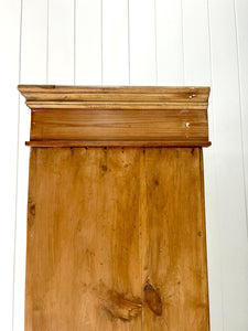 A Handsome English 19th Pine Cupboard with Dark Wooden Knobs