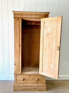 A Handsome English 19th Pine Cupboard with Dark Wooden Knobs