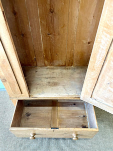 A Handsome English 19th Pine Cupboard with Dark Wooden Knobs