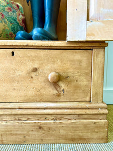 A Handsome English 19th Pine Cupboard with Dark Wooden Knobs