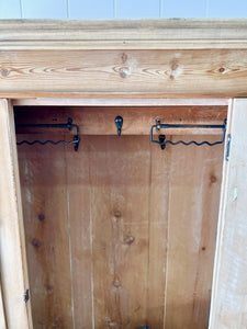 A Handsome English 19th Pine Cupboard with Dark Wooden Knobs