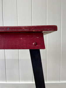 An Old Cottage Red and Black Painted Side Table