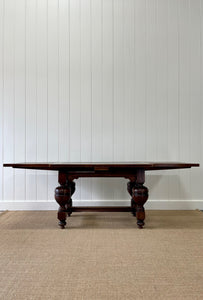 An English Country Oak Cup and Cover Draw Leaf Dining Table c1890