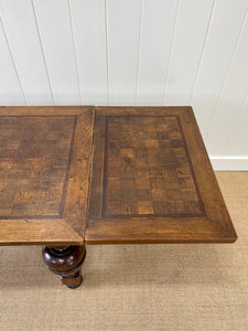 An English Country Oak Cup and Cover Draw Leaf Dining Table c1890