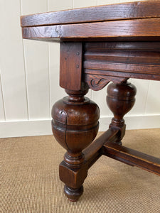 An English Country Oak Cup and Cover Draw Leaf Dining Table c1890