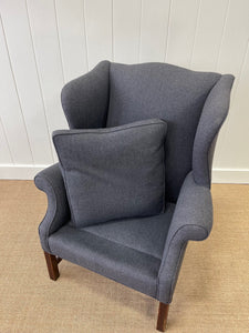 An Antique English Mahogany Wing Back Chair