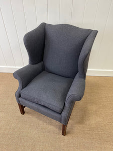 An Antique English Mahogany Wing Back Chair