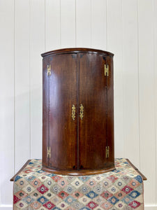 A Exquisite Georgian Oak Hanging Corner Cupboard c1800