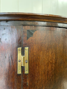 A Exquisite Georgian Oak Hanging Corner Cupboard c1800