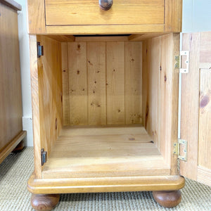 A Charming Pair of Antique English Pine Nightstands