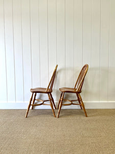 A Set of Four Ash Crinoline Stretcher Windsor Chairs