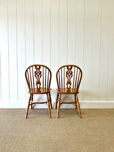 A Set of Four Ash Crinoline Stretcher Windsor Chairs