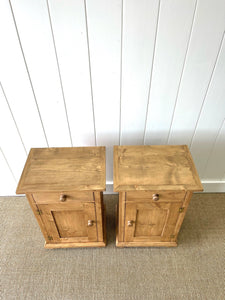 A Charming Pair of English Pine Nightstands with Bun Feet