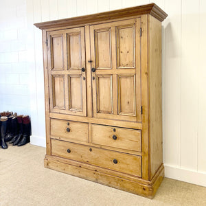 An 18th Century English Pine Linen Press Cupboard