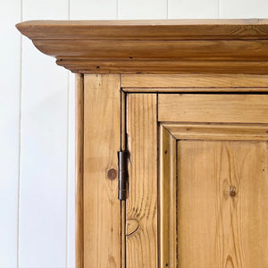 An 18th Century English Pine Linen Press Cupboard