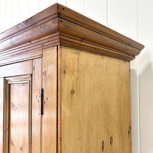 An 18th Century English Pine Linen Press Cupboard