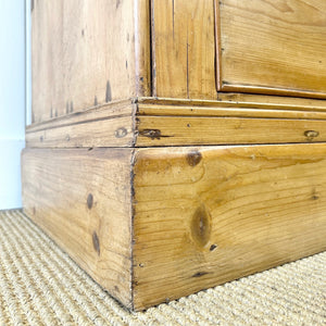 An 18th Century English Pine Linen Press Cupboard