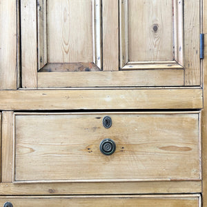 An 18th Century English Pine Linen Press Cupboard