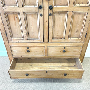 An 18th Century English Pine Linen Press Cupboard