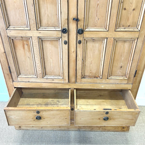 An 18th Century English Pine Linen Press Cupboard