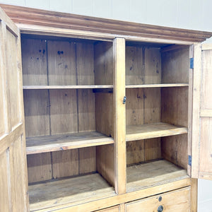 An 18th Century English Pine Linen Press Cupboard