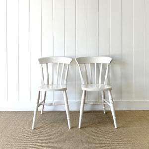 A Vintage Set of 4 White Slat Back Chairs