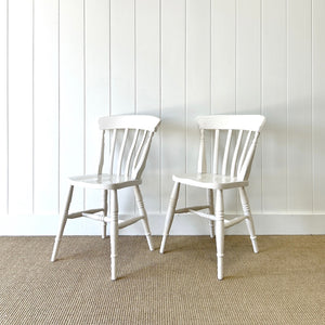 A Vintage Set of 4 White Slat Back Chairs