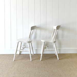 A Vintage Set of 4 White Slat Back Chairs