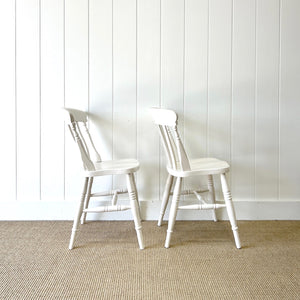 A Vintage Set of 4 White Slat Back Chairs