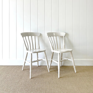 A Vintage Set of 4 White Slat Back Chairs