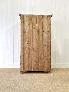 A 19th Century Pine Cupboard with Arched Doors