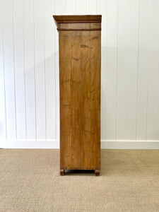 A 19th Century Pine Cupboard with Arched Doors