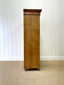 A 19th Century Pine Cupboard with Arched Doors