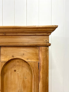 A 19th Century Pine Cupboard with Arched Doors