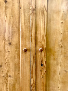 A 19th Century Pine Cupboard with Arched Doors