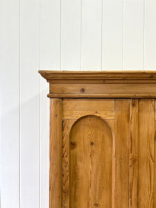 A 19th Century Pine Cupboard with Arched Doors