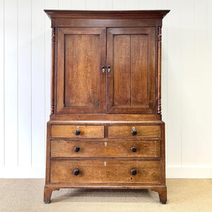 A Large Early 19th Century English Oak Linen Press Housekeepers Cupboard