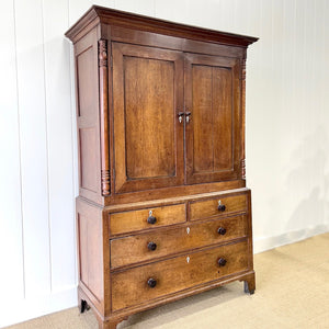 A Large Early 19th Century English Oak Linen Press Housekeepers Cupboard