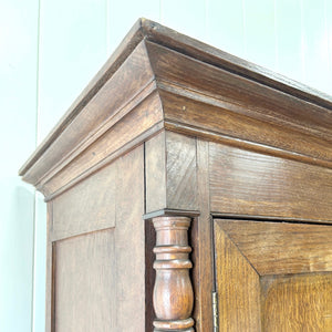 A Large Early 19th Century English Oak Linen Press Housekeepers Cupboard