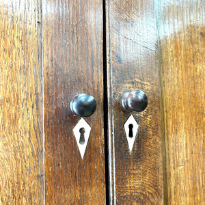 A Large Early 19th Century English Oak Linen Press Housekeepers Cupboard