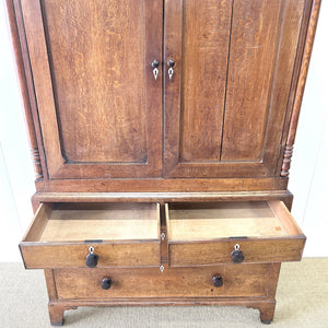 A Large Early 19th Century English Oak Linen Press Housekeepers Cupboard