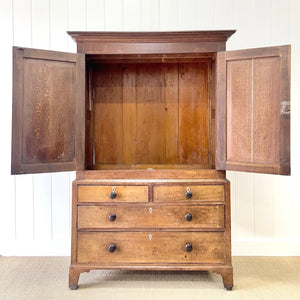 A Large Early 19th Century English Oak Linen Press Housekeepers Cupboard